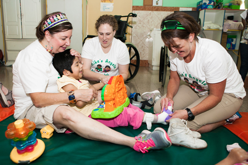 Catherine liked fidgeting with her Benik velcro straps, and she kept teasing Kelly by taking it off. It was so cute and funny and even the caregivers were laughing with us at her little mischievous pe